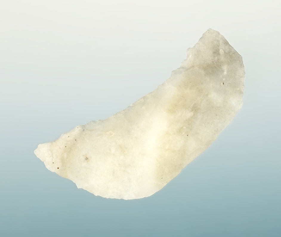 1 1/2" Paleo Crescent made from Agate. Found by R.D. Mudge in Nevada. Ex. Gordon Erspamer.