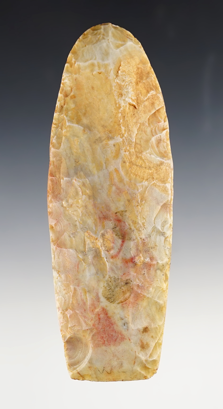 Colorful 5 1/2" African Neolithic flint Celt found in the Sahara Desert.