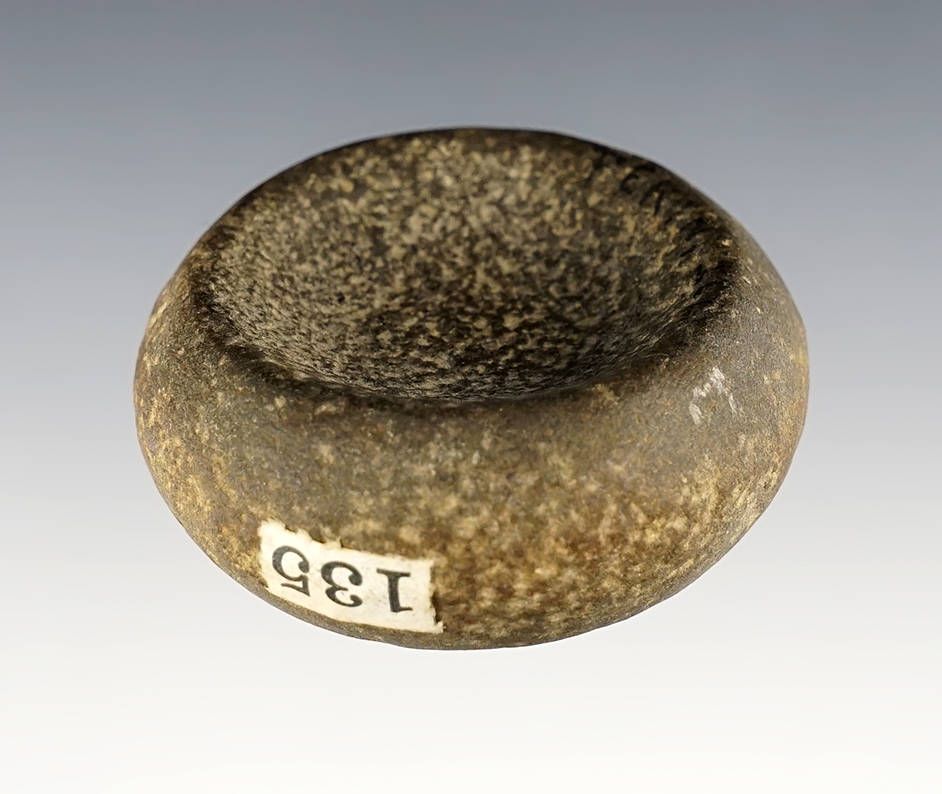 Fine and deeply scooped 2 1/8" wide Double Cupped Discoidal found in the Midwestern U.S.