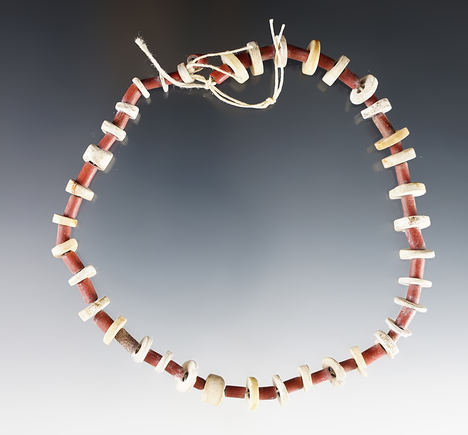 Set of 37 Shell Discs with Red Tube Beads. Found at the Power House Site in Lima, New York.