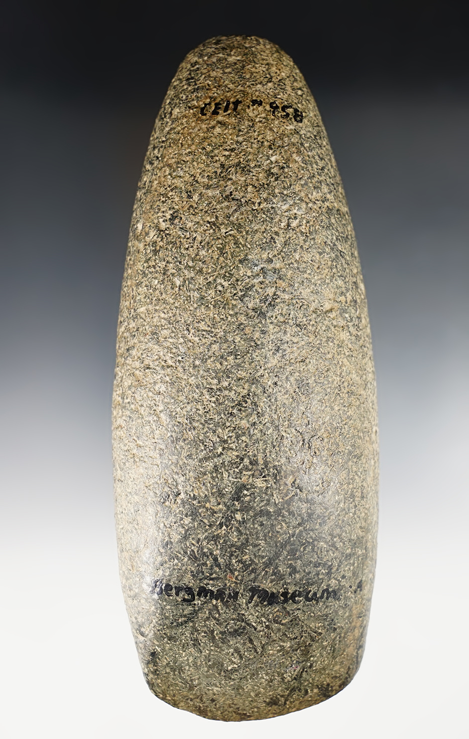 Nice polish on this 6 7/8" Celt made from Straw Granite. Found in Indiana. Ex. Burgman Museum. 