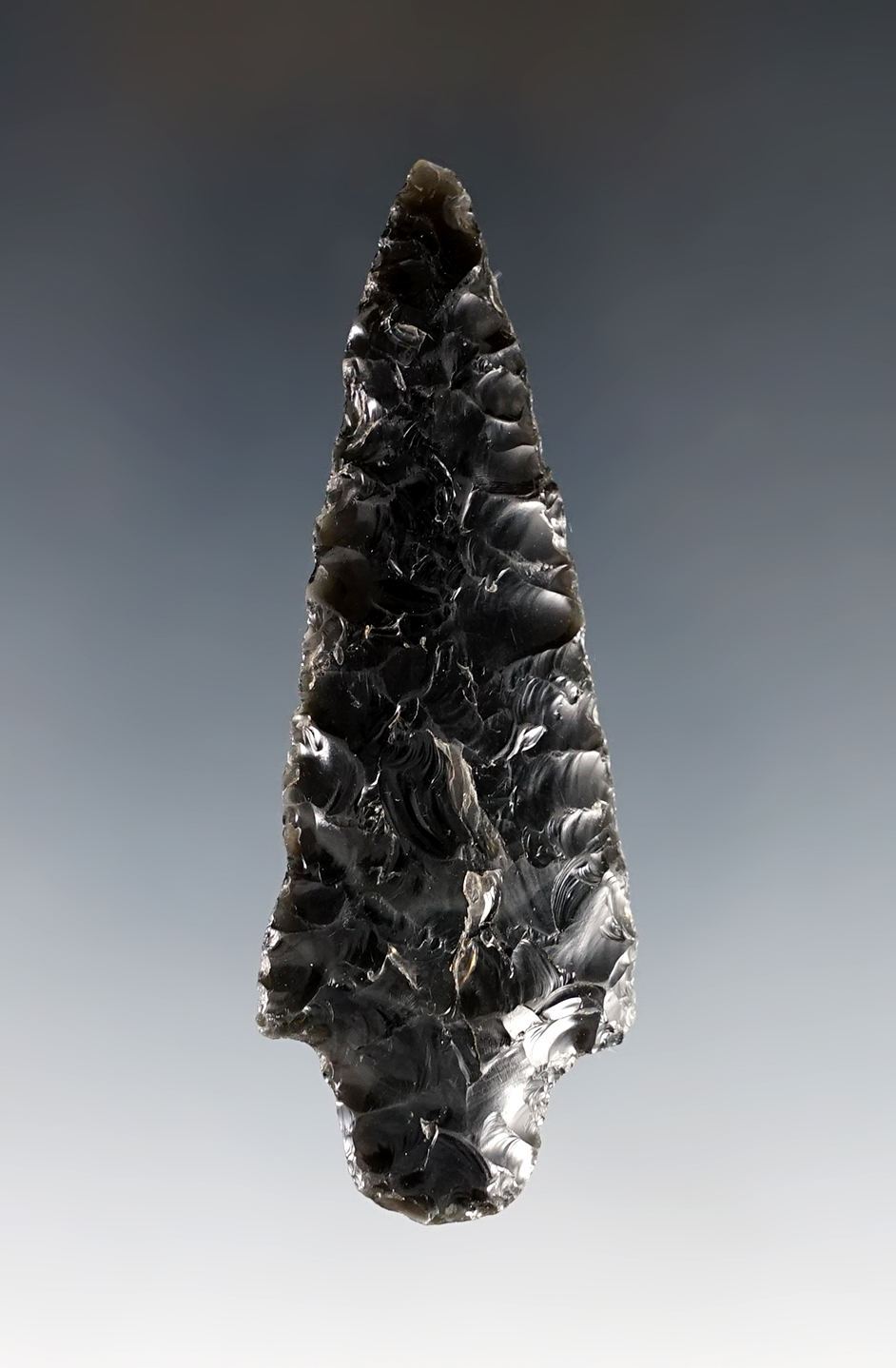 2 7/8" Gypsum Cave made from Obsidian. Found in the Falisteo River south of Santa Fe, New Mexico. 