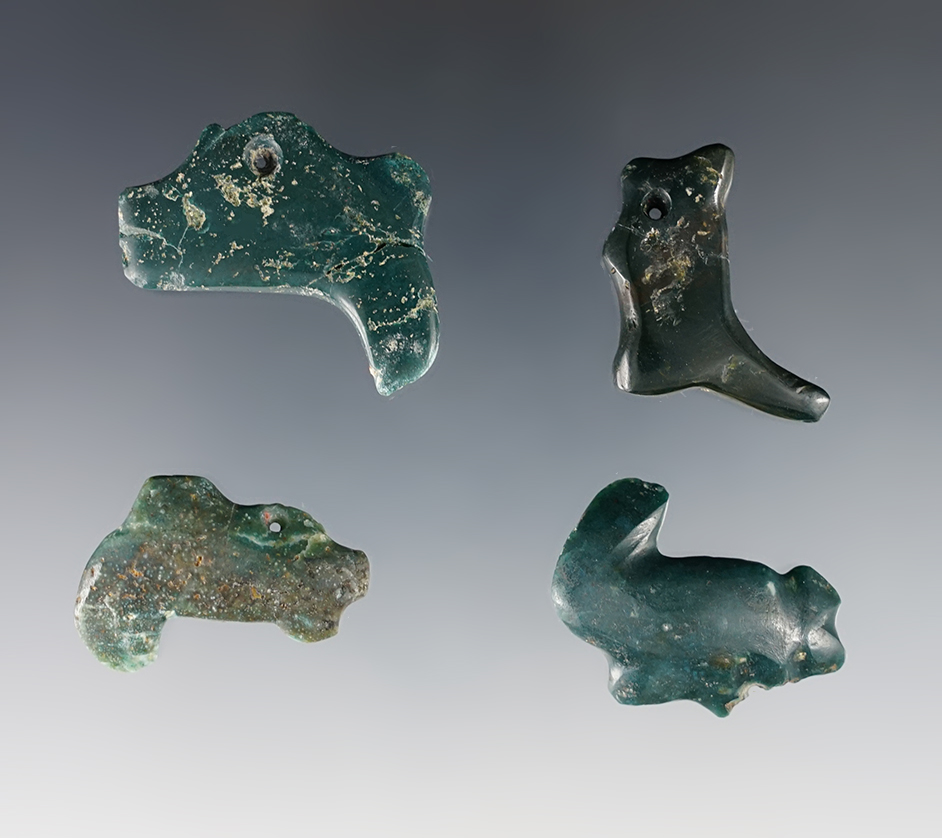 Set of 4 Various Pizote or Coatimundi pendants, translucent jade, Nicoya Peninsula, Costa Rica.