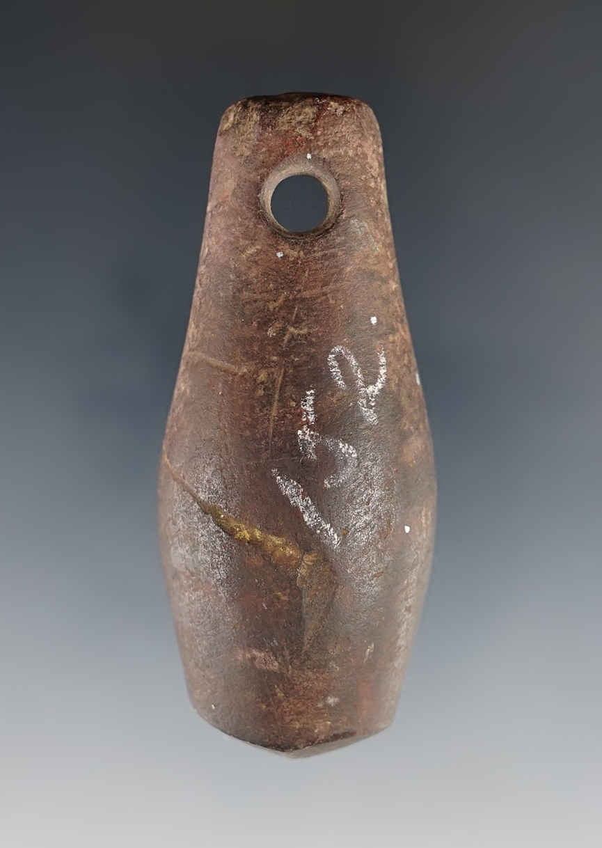 2 1/2" perforated hematite Plummet recovered in Wisconsin.