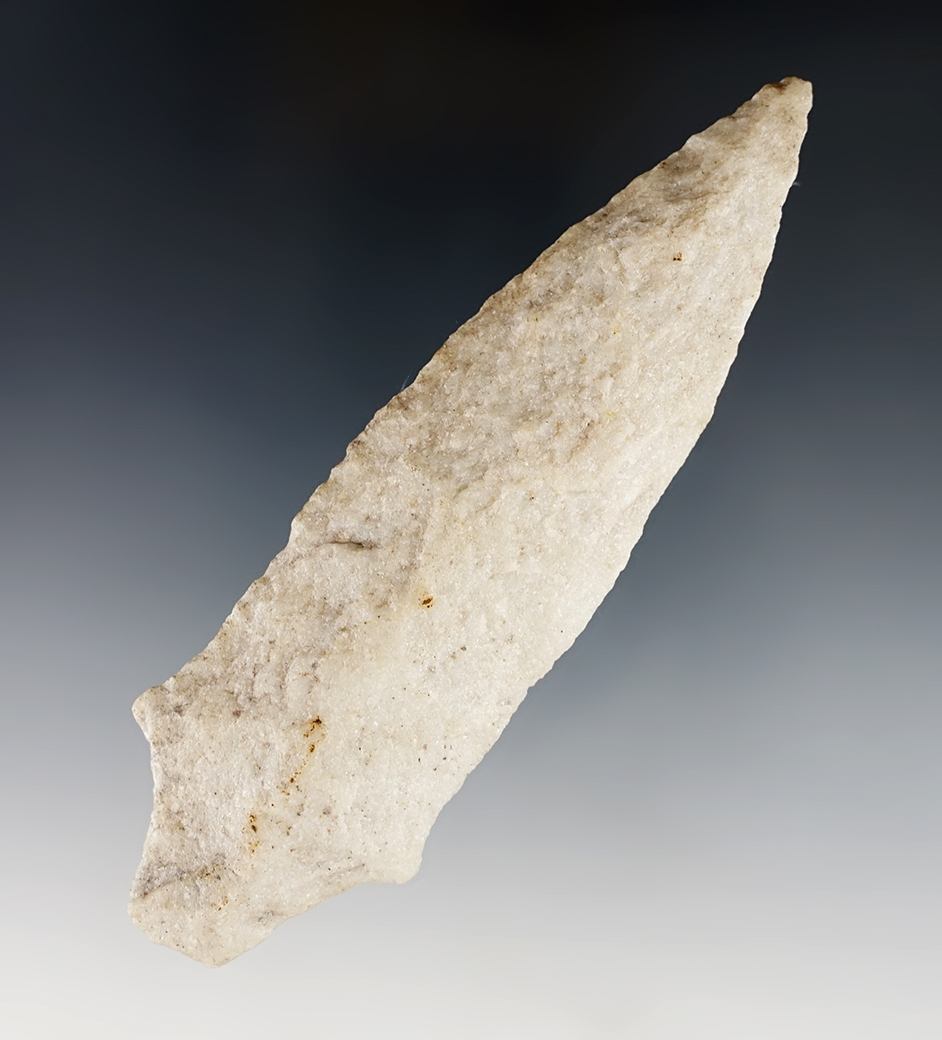 4 3/4" Stemmed point made from patinated Quartz. Found in Pennsylvania.