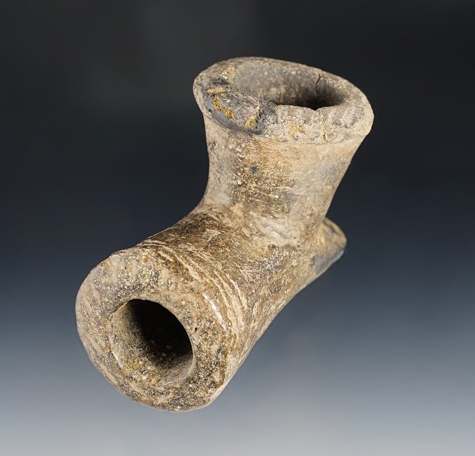 3 9/16" long Mississippian period clay pipe with minor restoration recovered in Missouri.