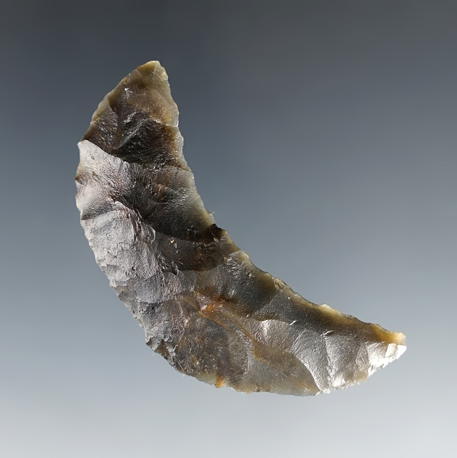 Well patinated 2 1/16" Paleo Crescent found in the Black Rock Desert region of Northern Nevada.