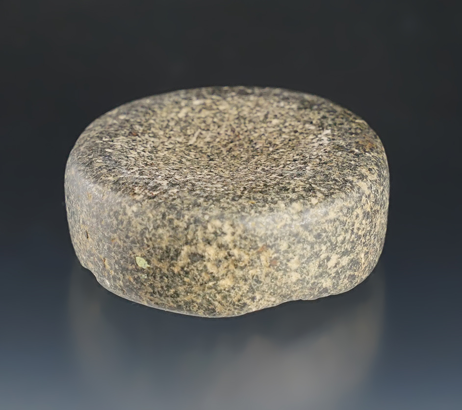 Nicely polished double cupped 1 7/8" diameter discoidal recovered in Pike County Ohio.