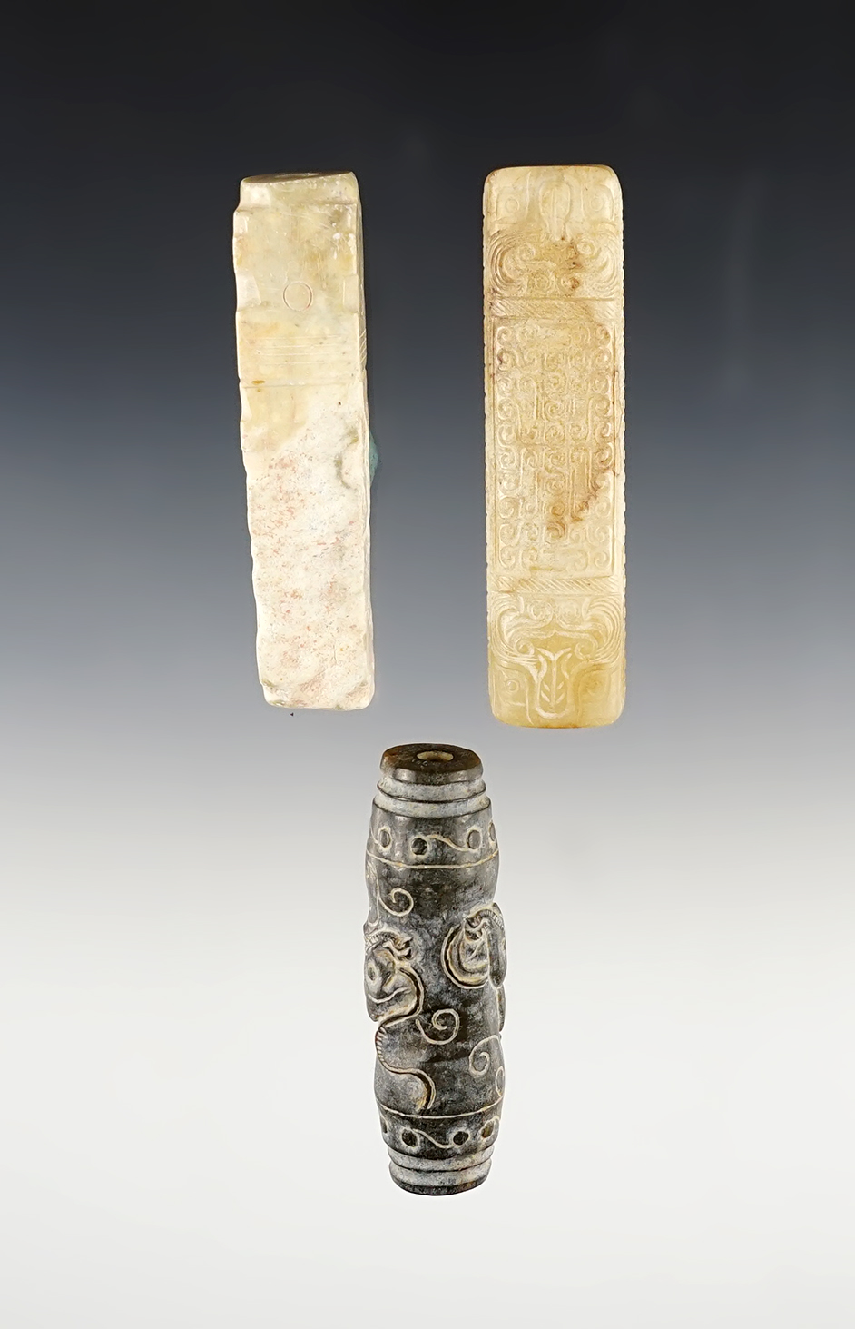 Set of 3 beautifully carved Jade Beads. Recovered is Southeast Asia. Largest is 3". 