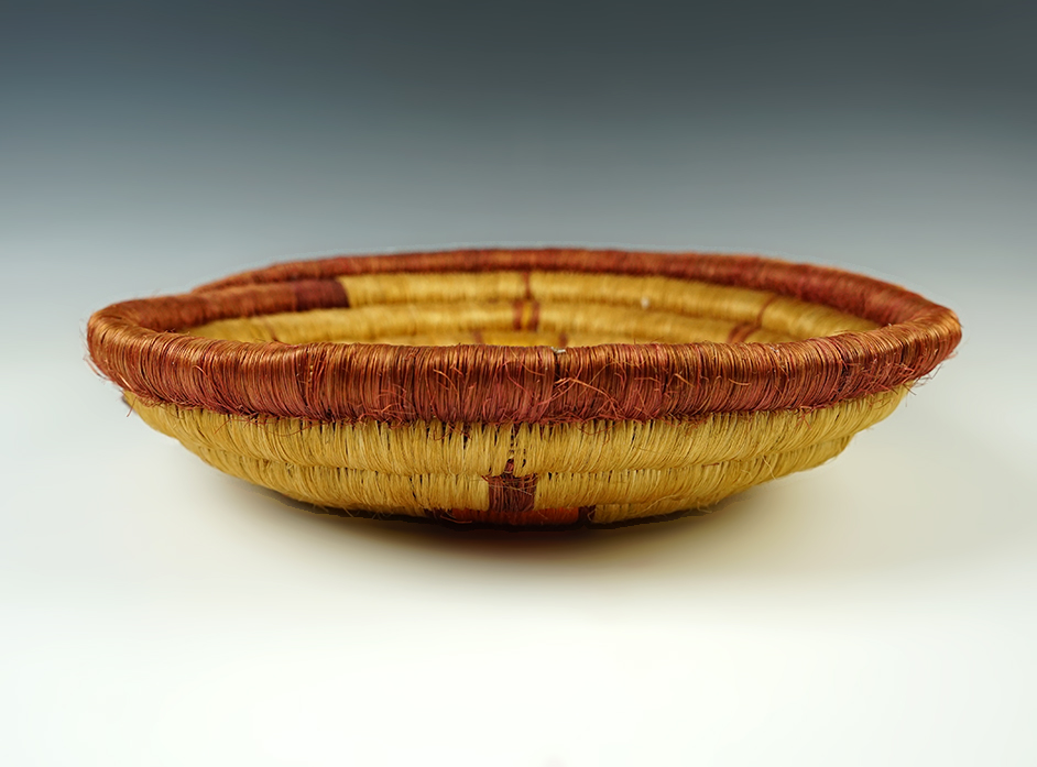 10 1/2" diameter Coil Basket that is very colorful. 