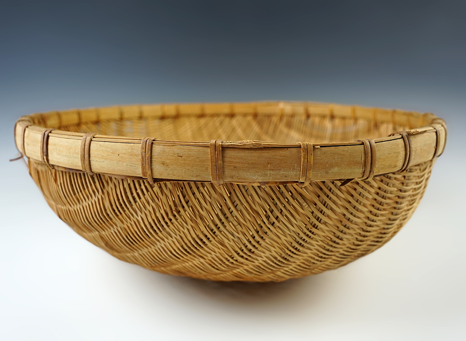 13" wide by 4'' tall woven basket in excellent condition that displays supurb craftsmanship. 
