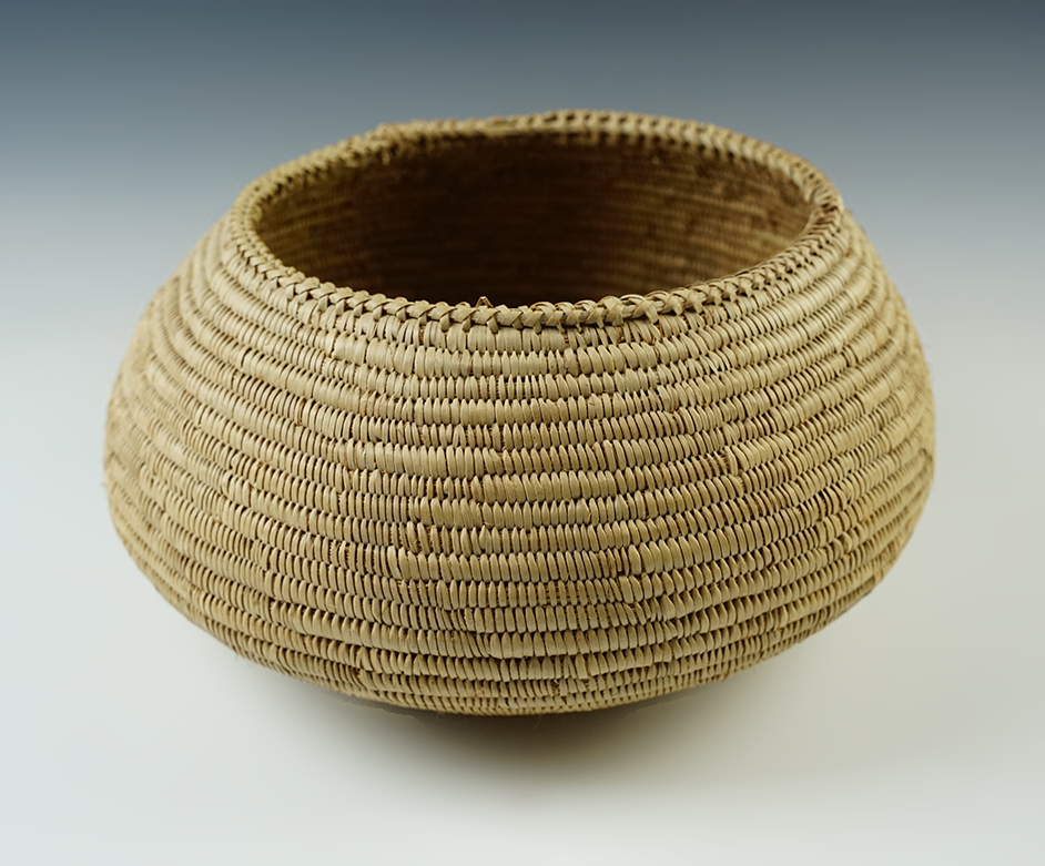 9 1/2" wide by 5" tall Vintage Indian Basket that is beautifully woven. Purchased in 1941 in MN. 