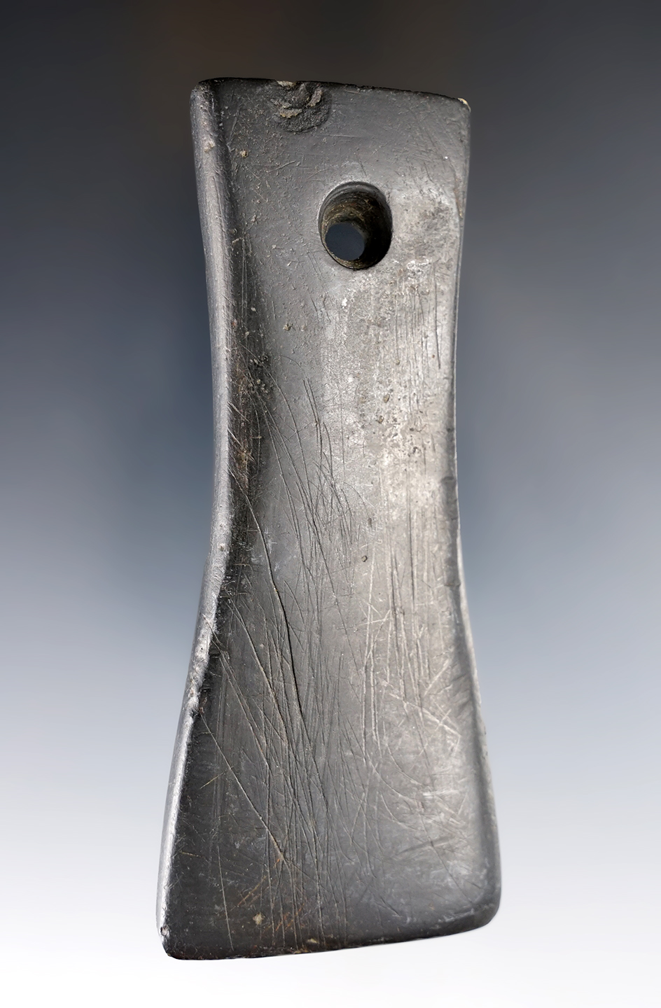 4 1/4" Adena Pendant made from black Slate. Found in Wood Co., Ohio. Pictured in "Who's Who", #8