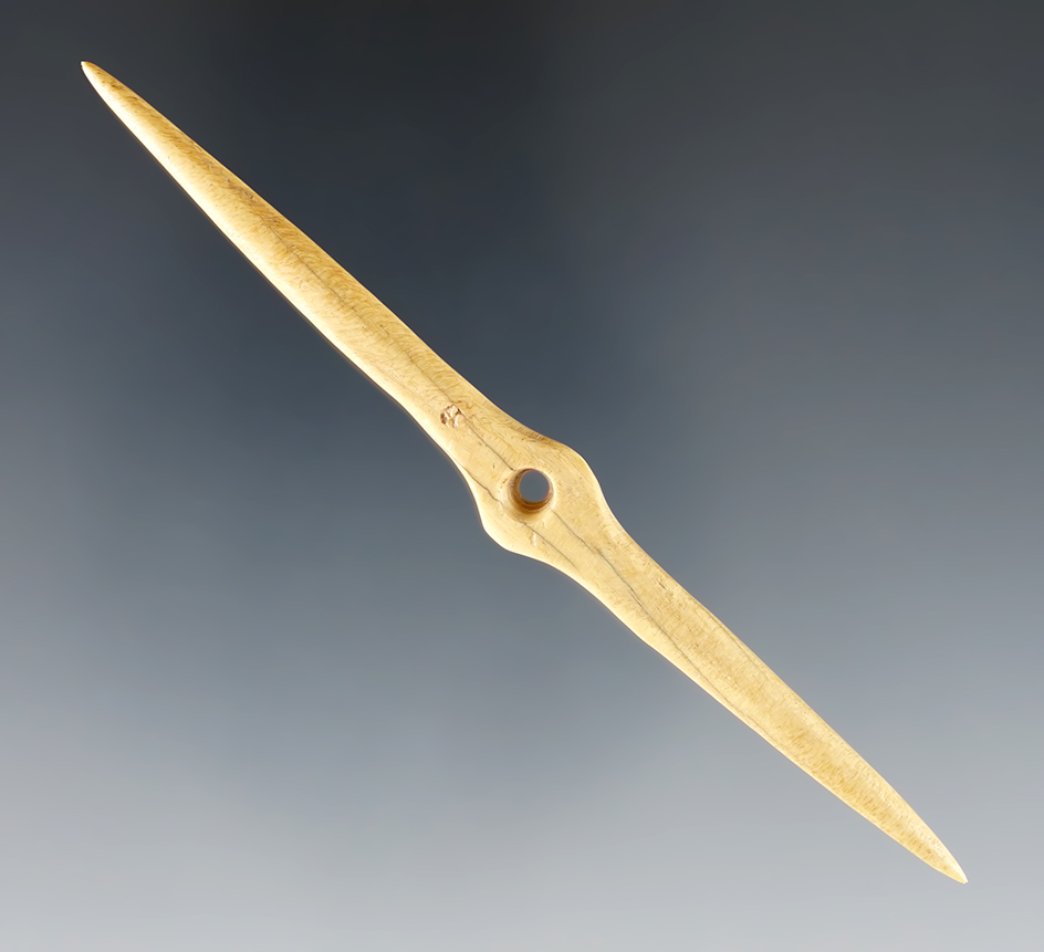 Very unique 3 7/8" Perforated Bone that is very well polished. Sacramento Valley, California.