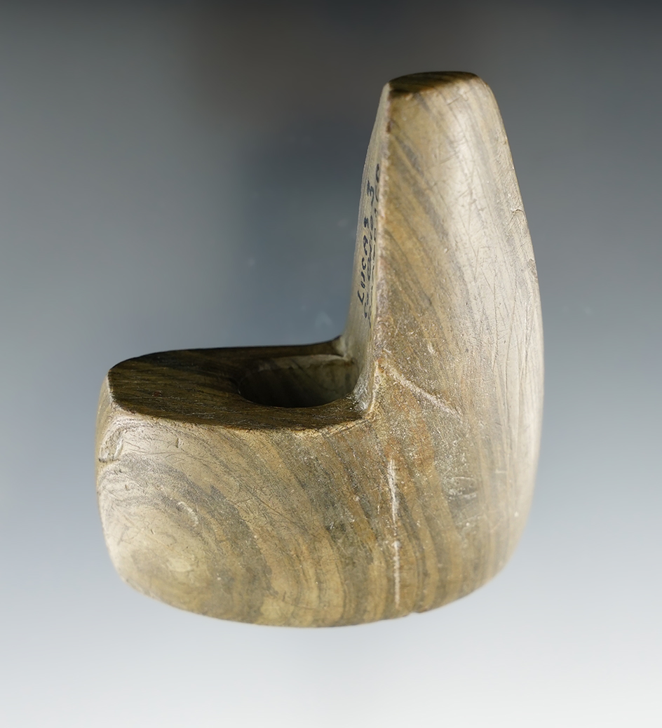 2 5/16" Archaic Geniculate made from green and black Banded Slate. Found in Lucas Co., Ohio.