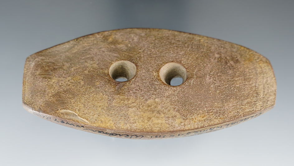 3 3/4" Glacial Kame Expanded Center Gorget found in Southwest Ontario. Pictured in Who’s Who