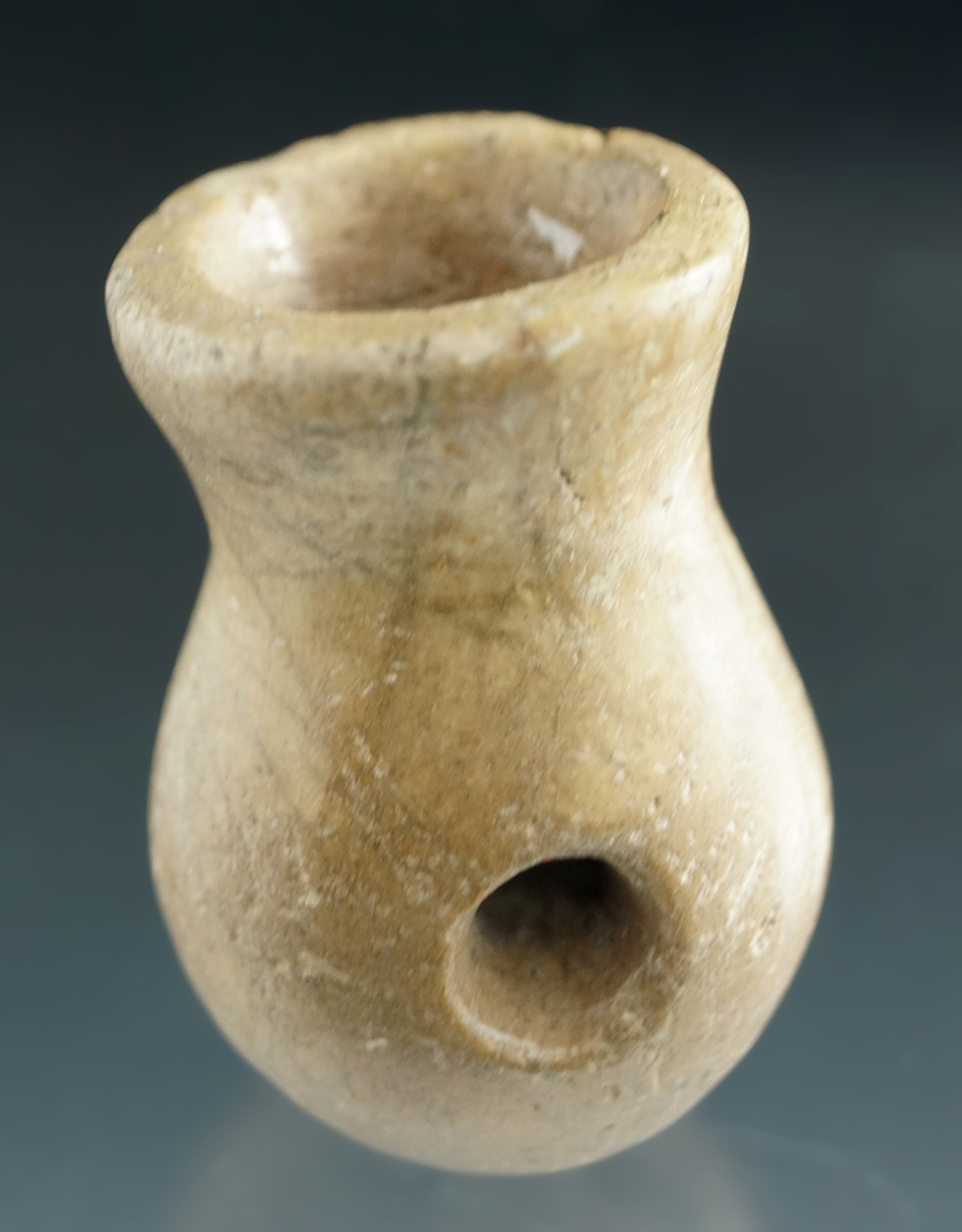 1 11/16" Pipestone Vasiform Bowl Pipe with unique suspension perforation found in New York.