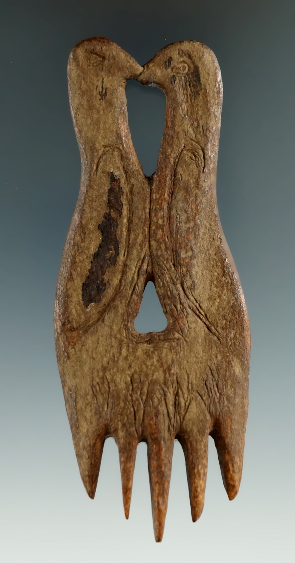 Beautiful 4" tall "Kissing Swans" Iroquois bone comb found in New York. Excellent condition.