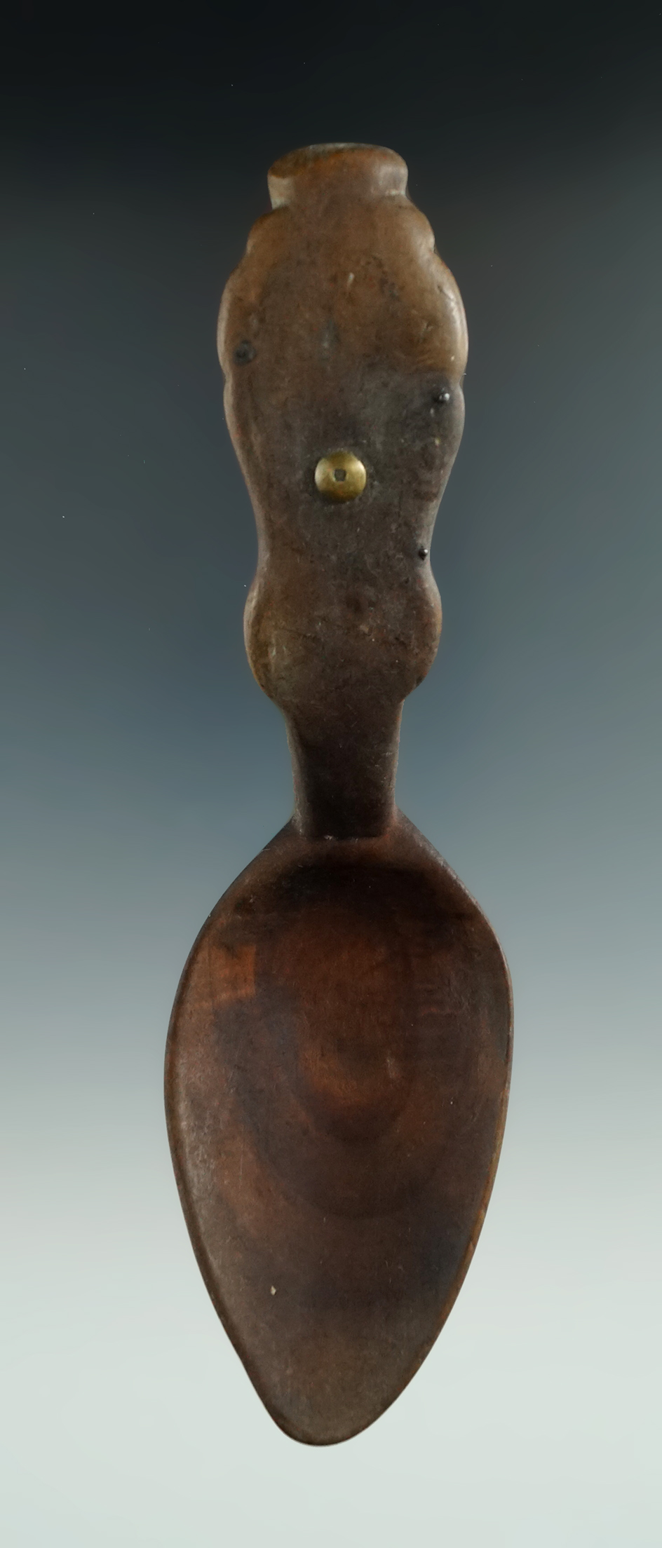 Very well styled 6 9/16" long Iroquois wooden spoon that is very well patinated.