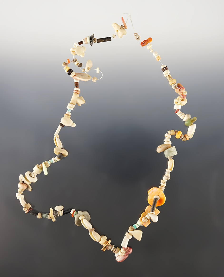 14" long strand of Stone and Shell Beads and Fetishes, recovered in the New Mexico/ Arizona area. 