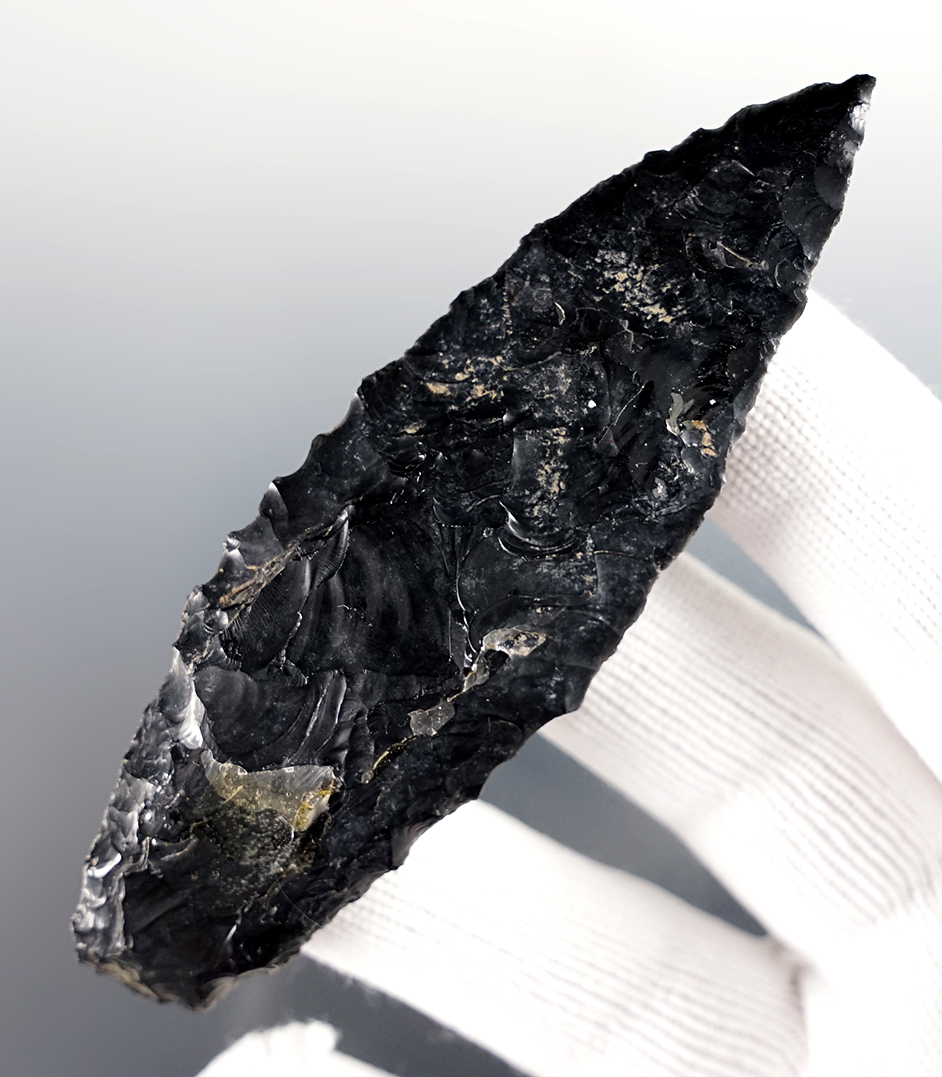 Heavily patinated 3 11/16" Parman with nicely serrated edges. Found in Harney Co., Oregon.