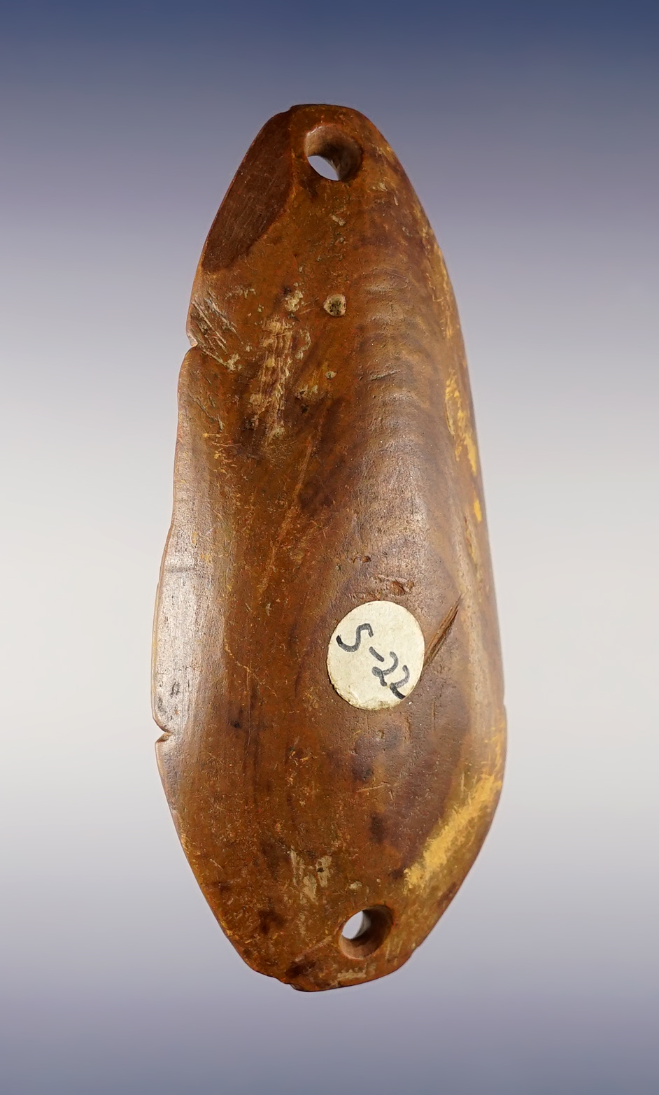 3 15/16" Humped Gorget found in Delaware, Ohio. Made from unique red and brown stone.