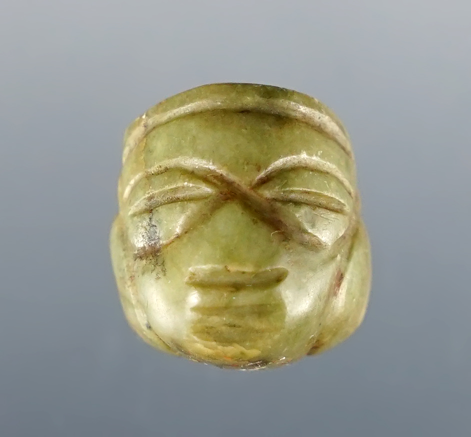 Fine 5/8" Miniature Mixtec Head Pendant made from green Jade. Recovered in Mexico. 