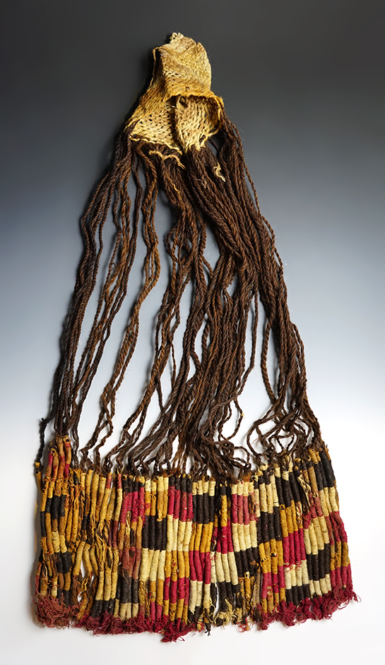  38" long by 21" wide Decorative hat with long woven drops from the Inca Culture, South America. 