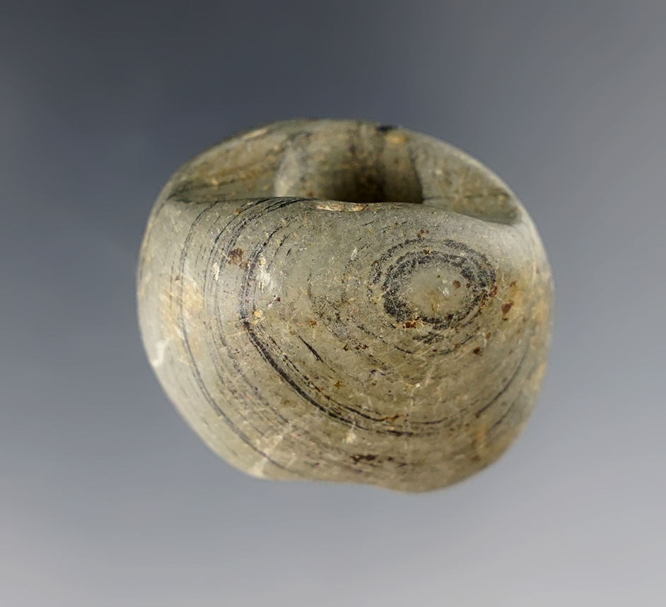 1 1/16" miniature Ball Bannerstone that is fluted on one end. Found in Clark Co., Ohio. 