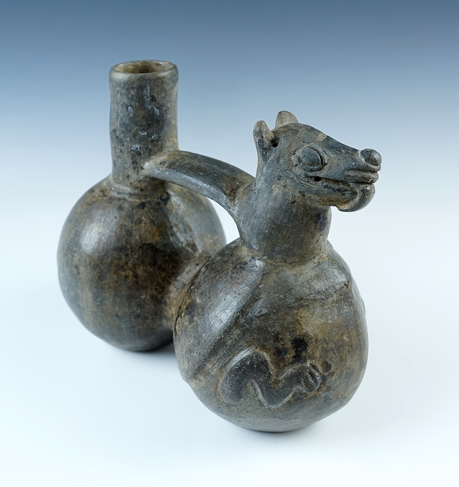 7" long by 3 3/8" tall Chimu Strap Handle Bottle with some minor restoration, South America. 