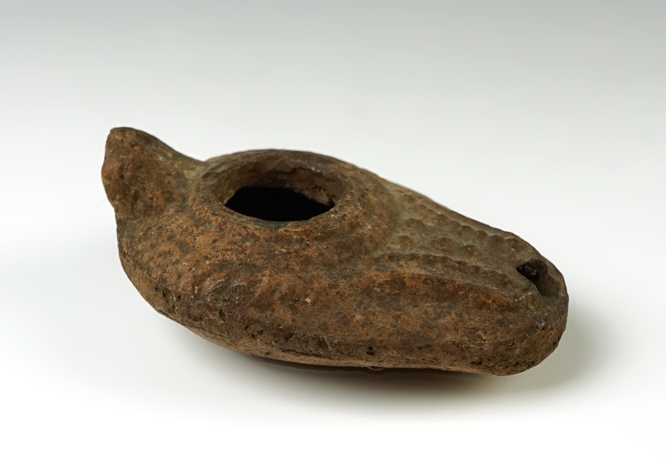 3 3/4" Holyland's oil lamp with excellent age on surface.