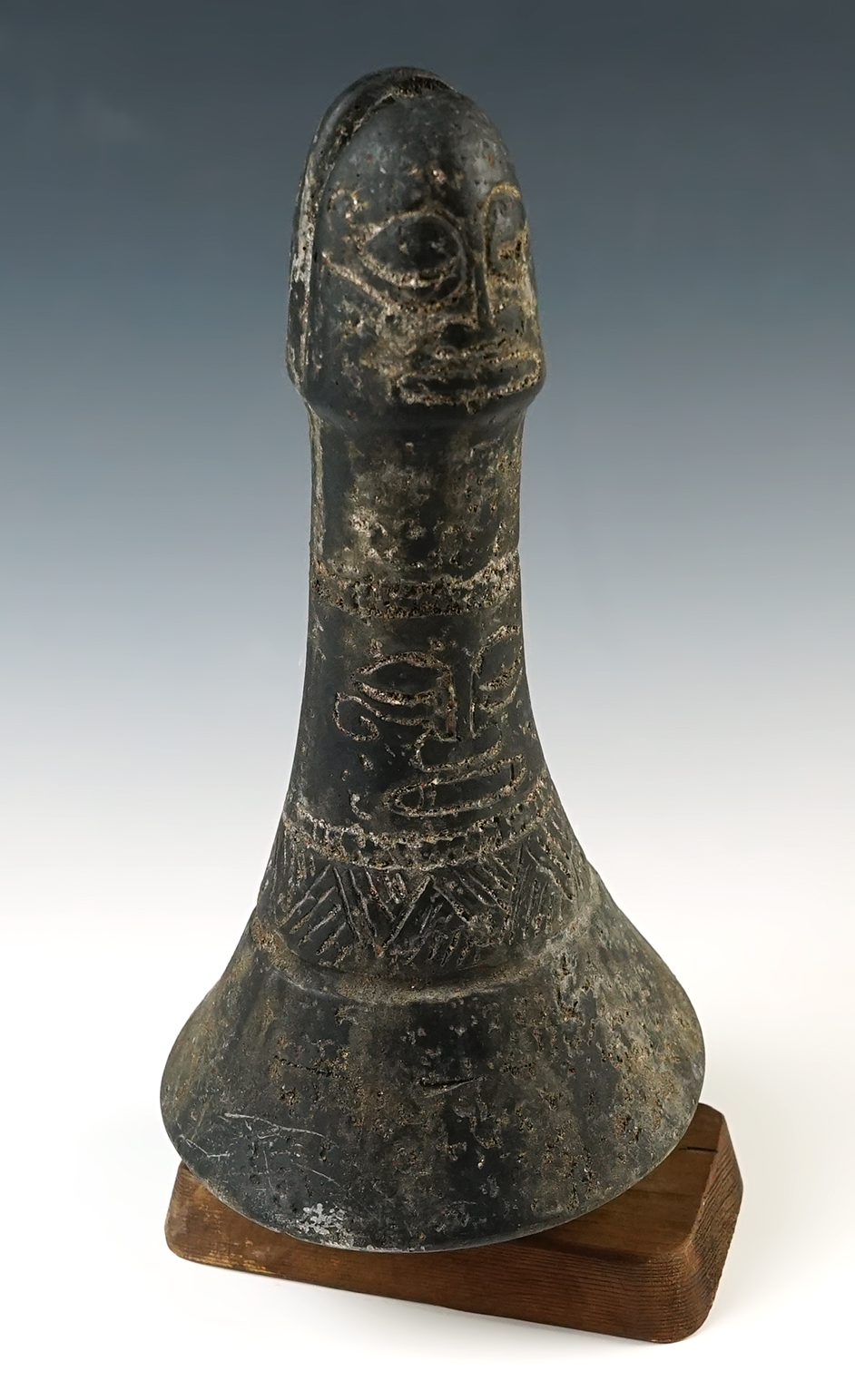 8" tall Hawaiian Poi pounder with nice engravings - permanently attached to a display stand.