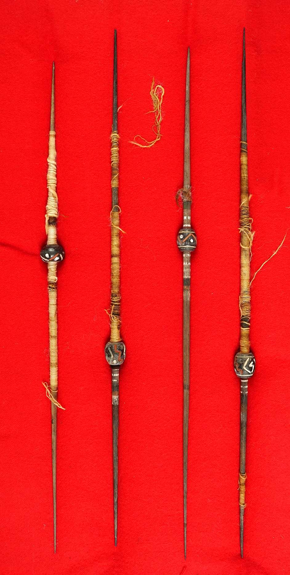 Set of 4 Pre-Columbian Spindle Pottery Whorls found in South America. The largest is 12 1/2".