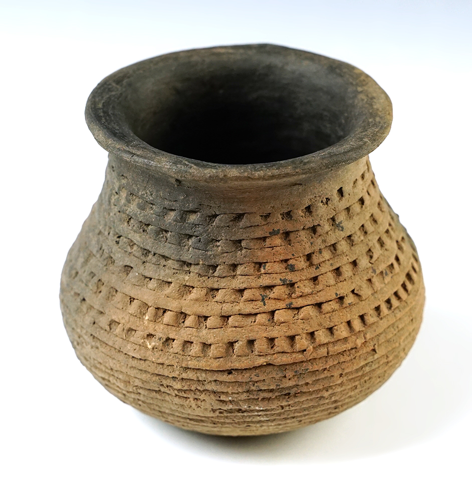 3 1/4" Corrugated Southwestern ancient Pottery Vessel with a nice intricate "Cord" design.