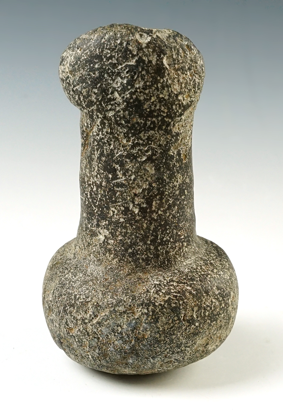 Uniquely styled 4 7/8" Ohio Pestle is excellent condition. Made from patinated Hardstone.