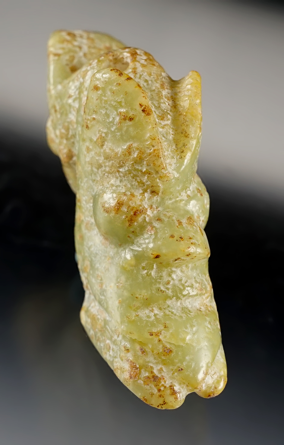 Very unique 3 3/8" Chinese Jade Pendant featuring multiple effigy images. Recovered in China
