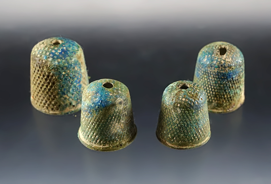 4 Thimbles w/ suspension holes. Townley-Read Site, Geneva, New York. Circa 1710-1745.