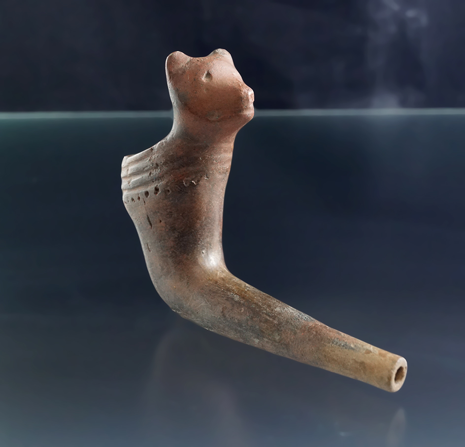 4" Long Iroquois Clay Bear Effigy Pipe found at the Dan site, near Letchworth, New York.