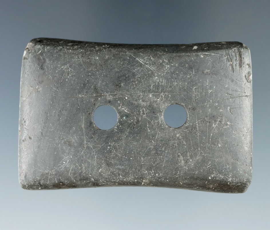 Unique heavily patinated 2 1/2" Bi-Concave Adena Gorget found in New York.