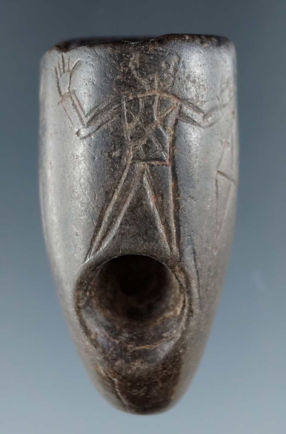 2" Vasiform stone Pipe with in incised design depicting a hunter with a bow. Ex. Rich Johnson.