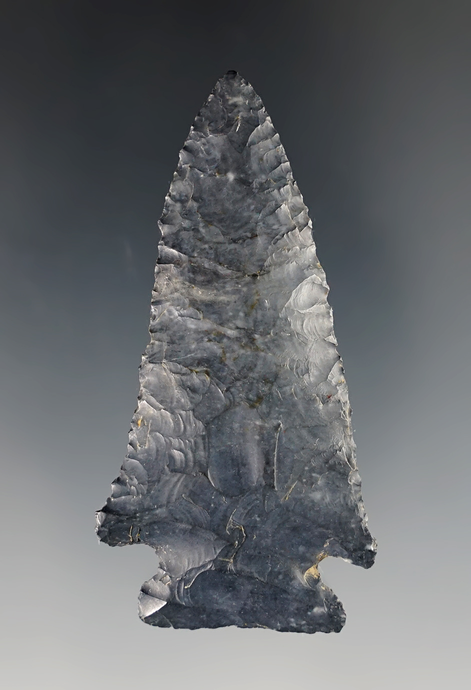 2 1/2" Ohio Archaic Cornernotch point made from bluish Coshocton Flint. Nice working and flaking.