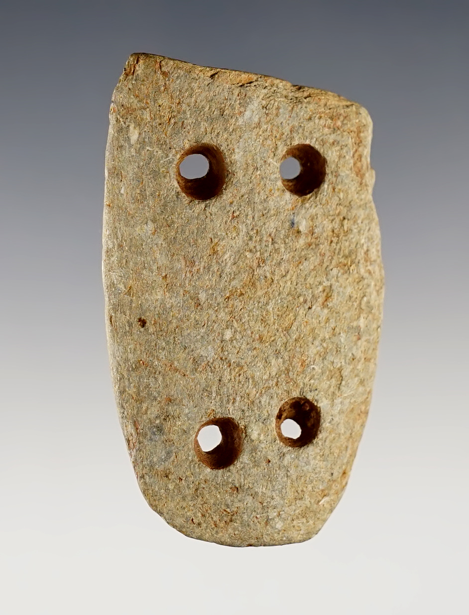 2 7/16" anciently salvaged 4-hole Gorget made from Steatite. Found in Pennsylvania.