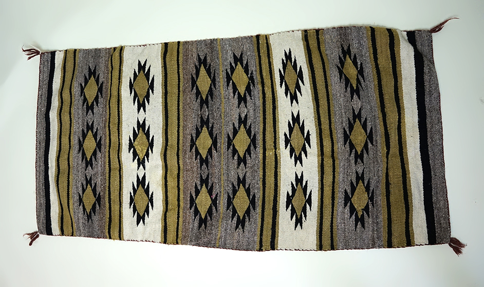 60" x 31" Southwestern Rug in nice condition. Ex. Eulert