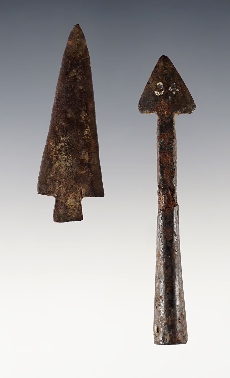 Pair of well patinated Iron Arrow Points from an old pre-1930's collection. The largest is 3".