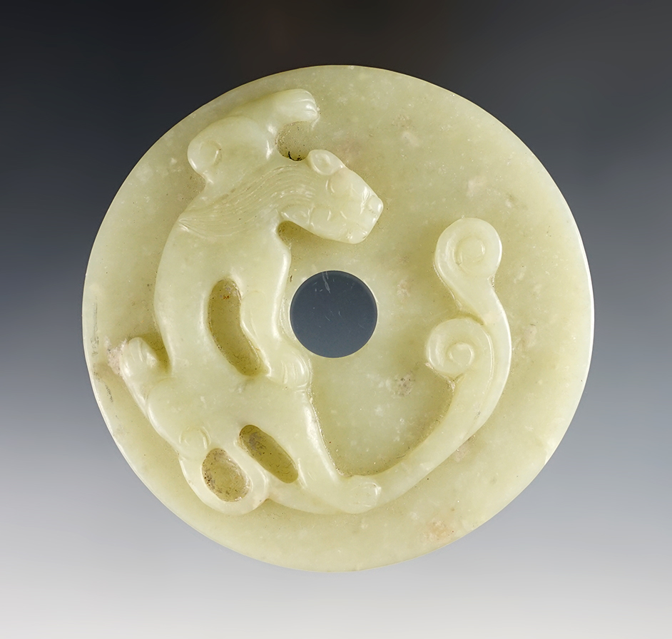 3 5/8" Beautifully carved Jade Bi-Disc with effigy in excellent condition. Recovered in China. 