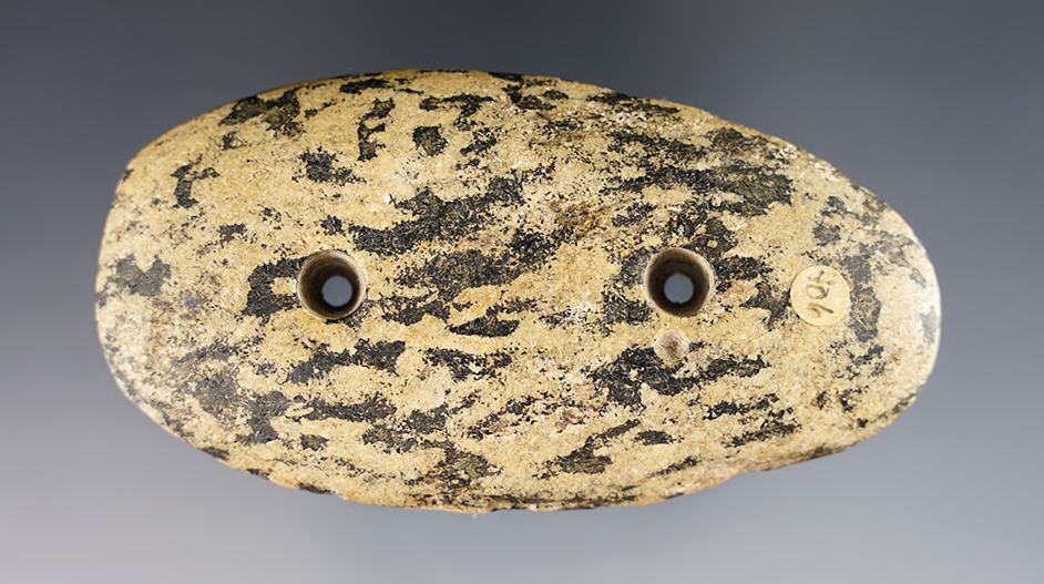 3 5/8" Gorget made from yellow and black Granite.