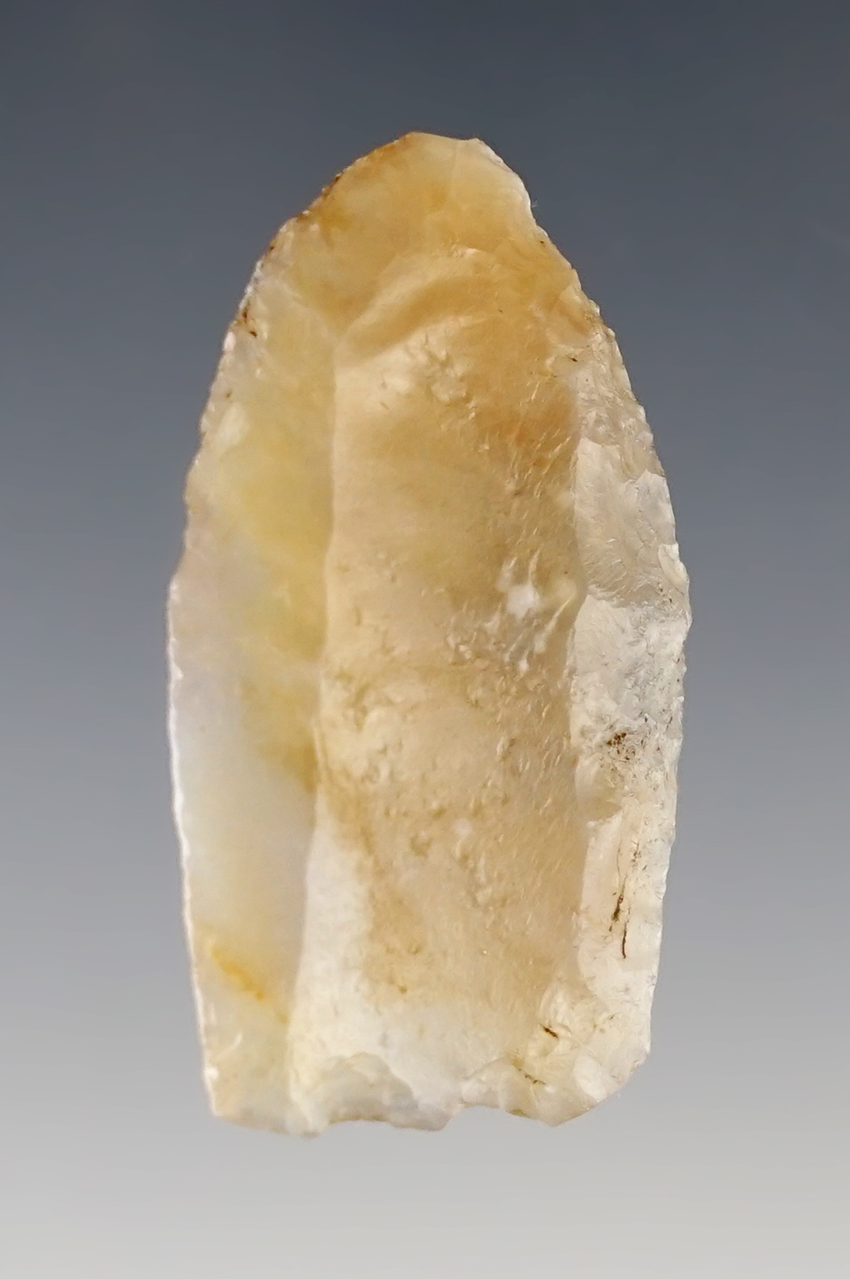 1 1/2" Paleo Folsom made from highly translucent Chalcedony. Excellent grinding.