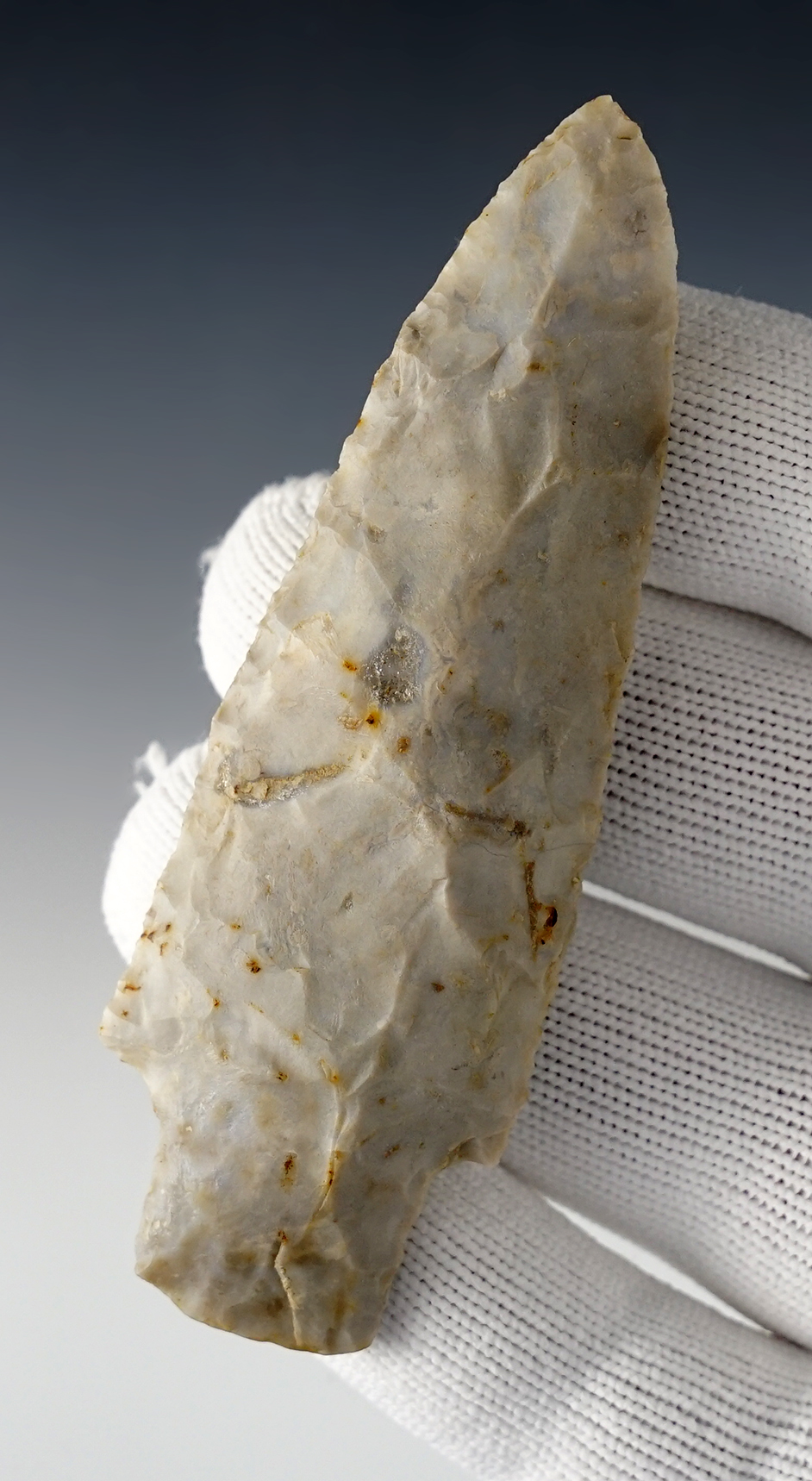 Nice 3 1/2" Adena with grinding to the basal area. Found in the Ohio/Indiana area.