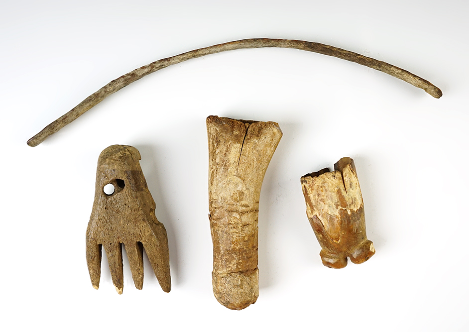 4 old bone Inuit artifacts from Alaska. Largest is 10 3/4 ".