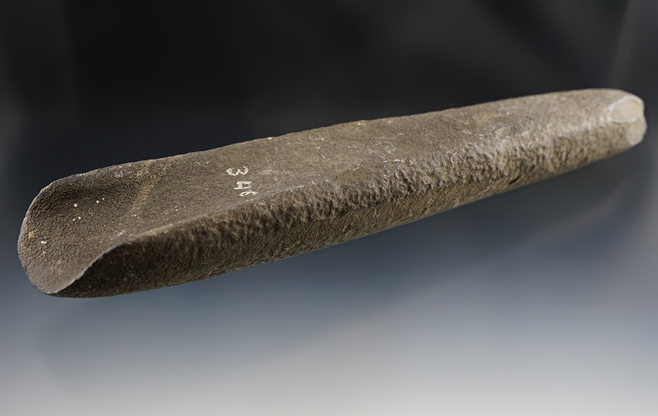 Large and 11" long nicely scooped Stone Gouge with excellent age on surface. New York area.